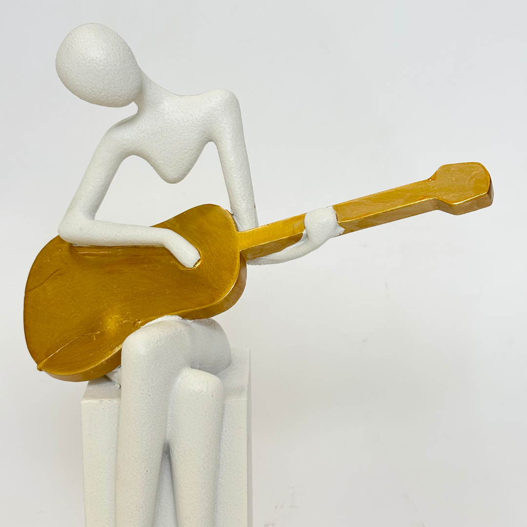 Guitar Player Statue