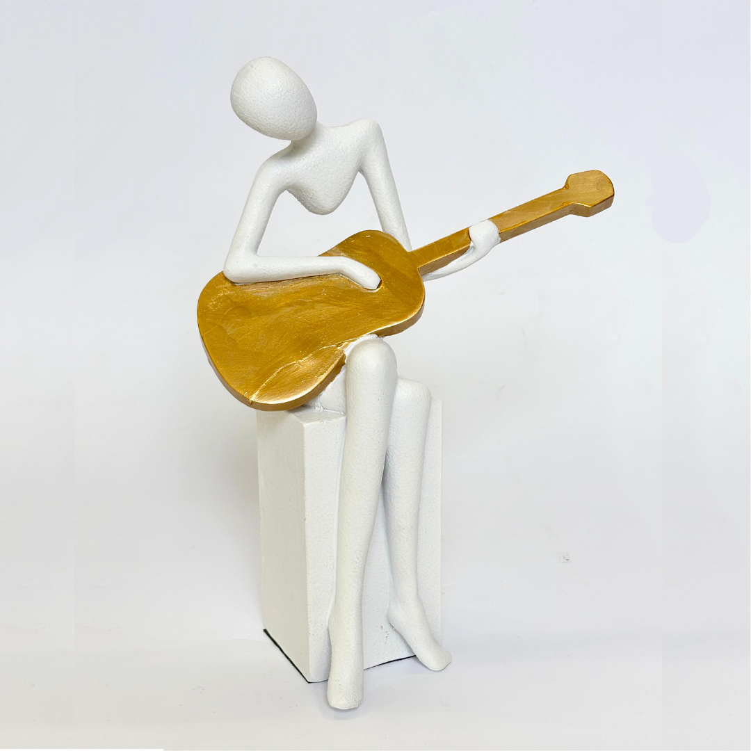 Guitar Player Statue
