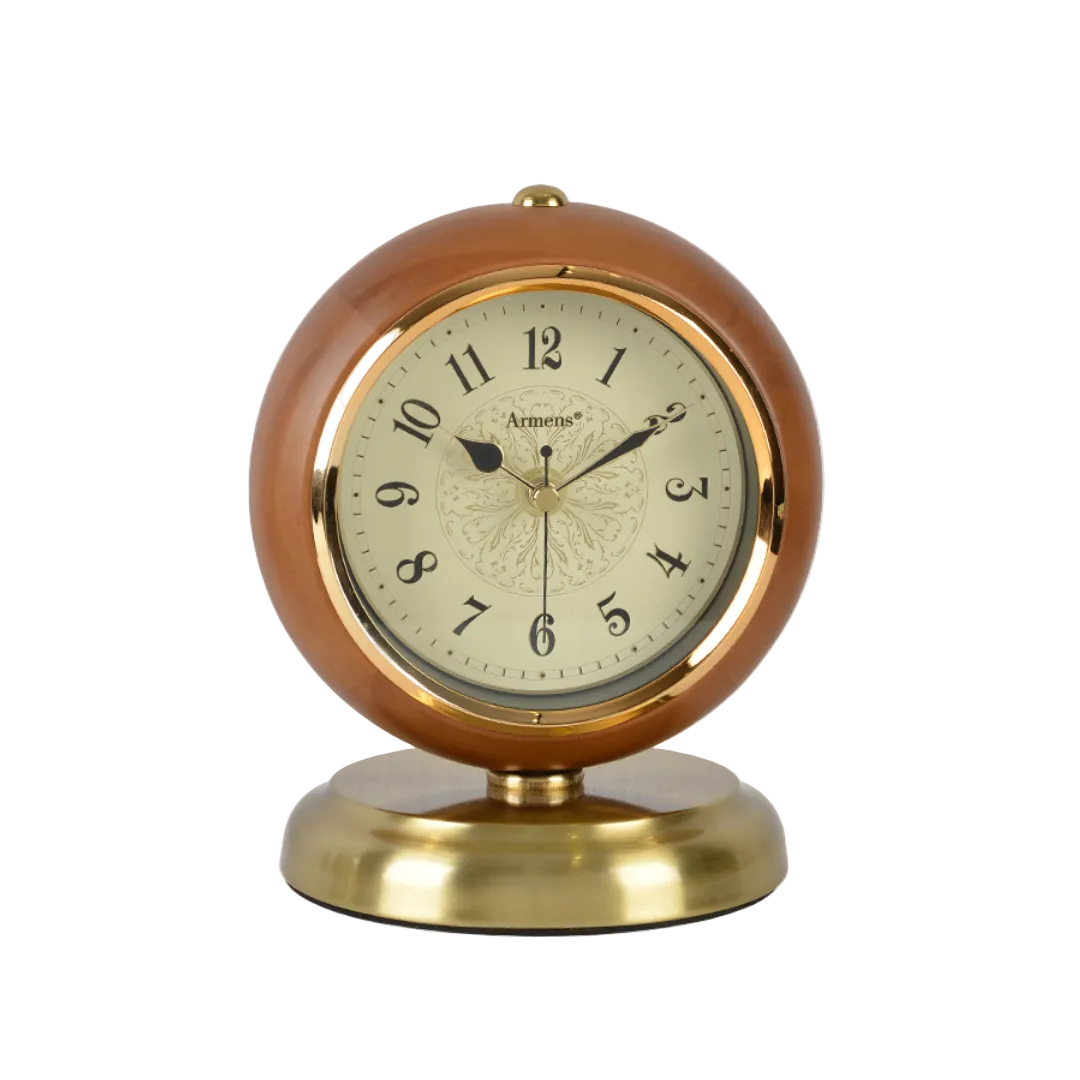 Round clock with wooden casing and gold base on a white background