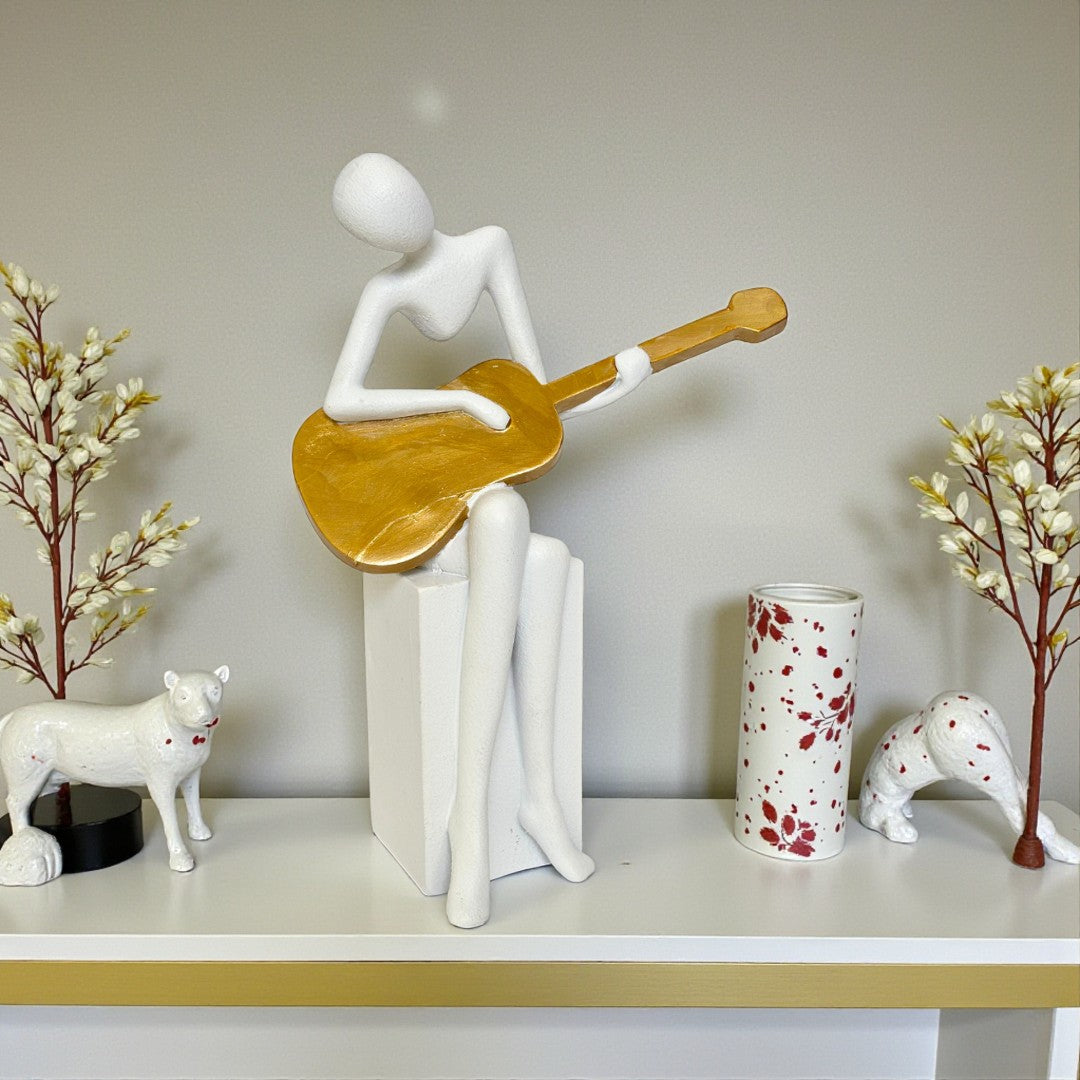 Guitar Player Statue