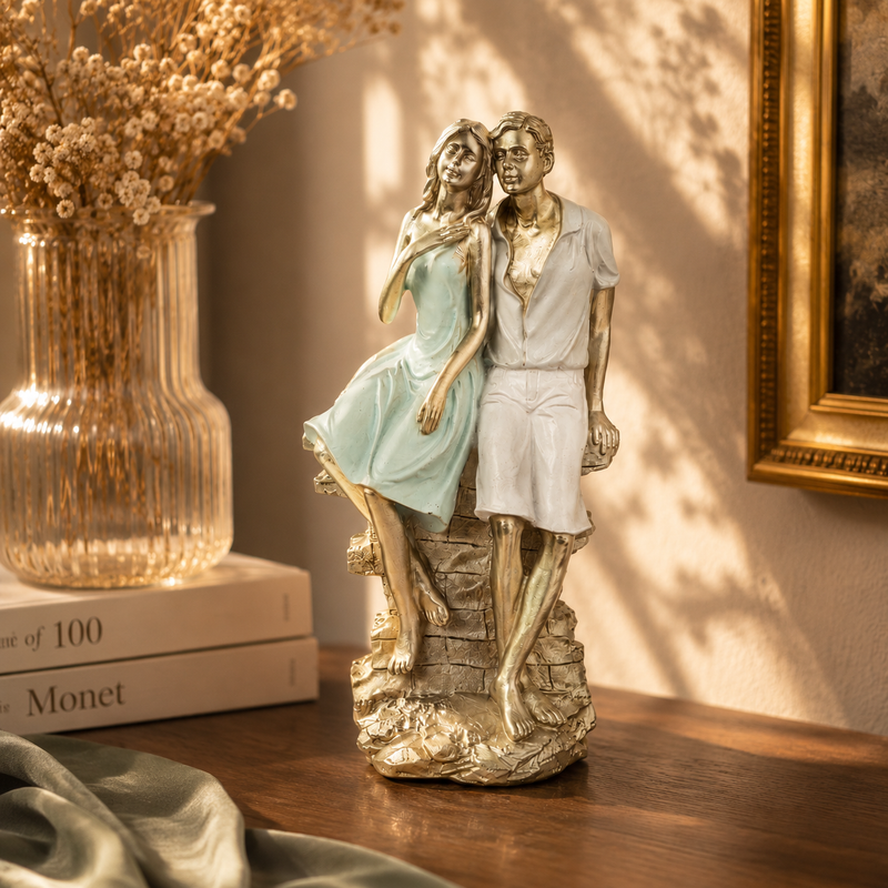 Seaside Seated Couple Sculpture