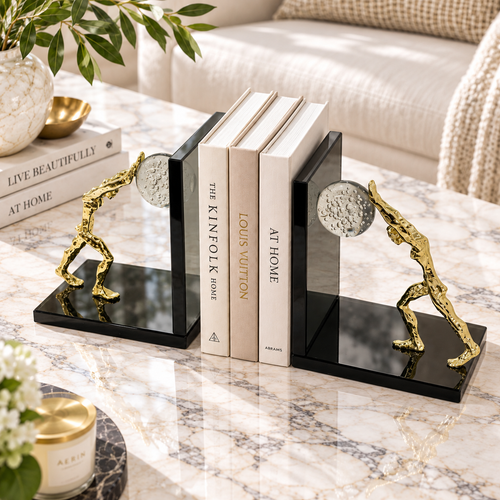 Golden Pushing Man Glass Bookends