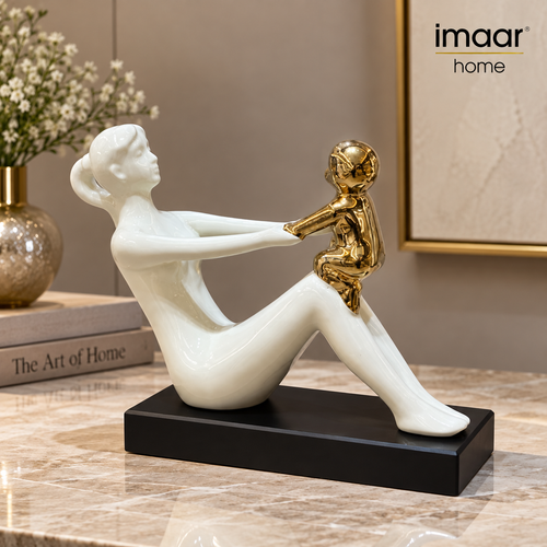 Modernist Mother Holding Child Statue
