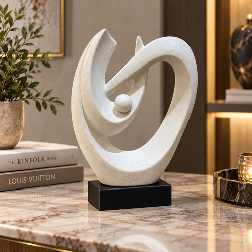 Elegant White Speckled Swirling Shell Statue