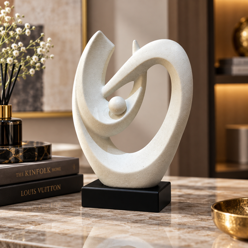 Elegant White Speckled Swirling Shell Statue
