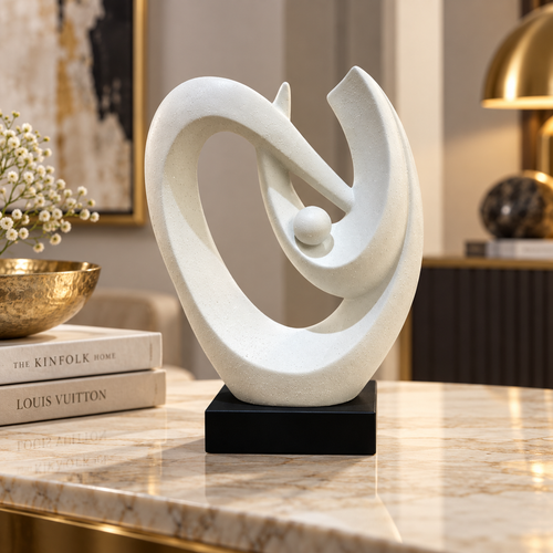 Elegant White Speckled Swirling Shell Statue