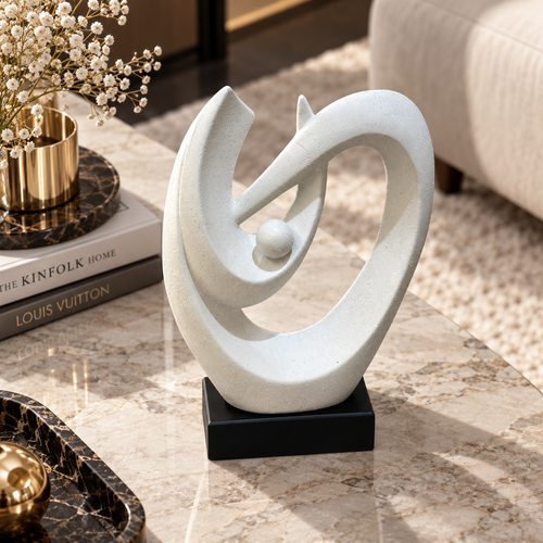 Elegant White Speckled Swirling Shell Statue
