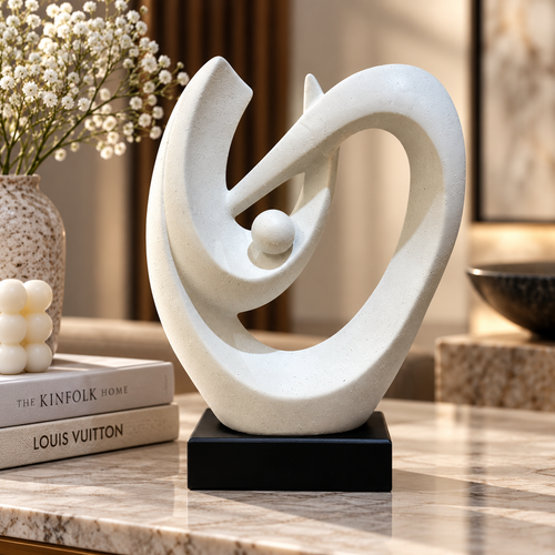 Elegant White Speckled Swirling Shell Statue