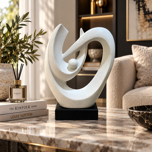 Elegant White Speckled Swirling Shell Statue