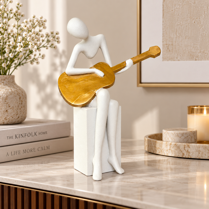 Guitar Player Statue