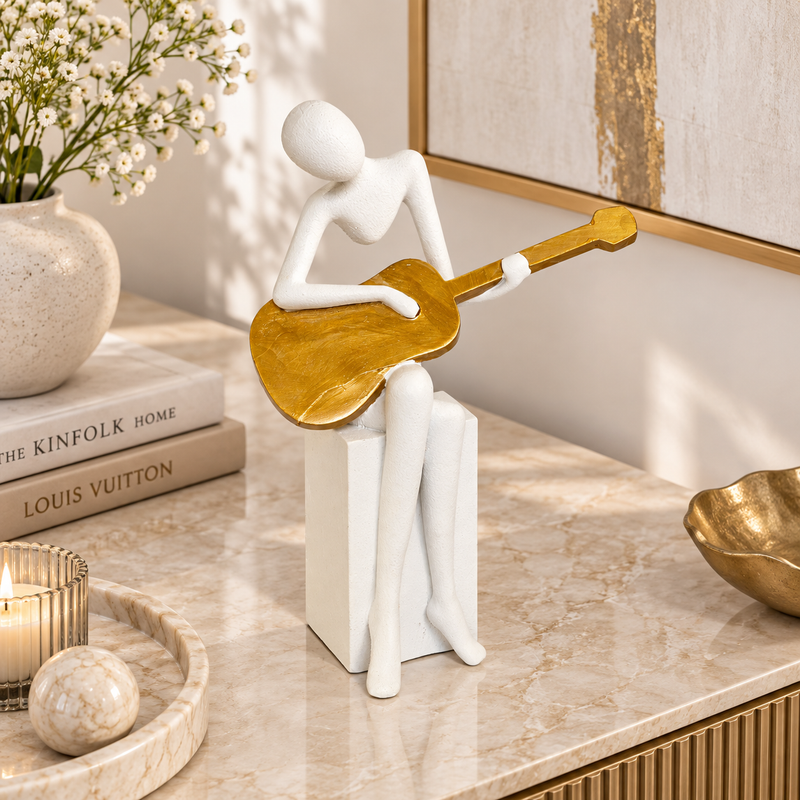 Guitar Player Statue