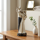 Bronze and White Family Sculpture with Gold Accents