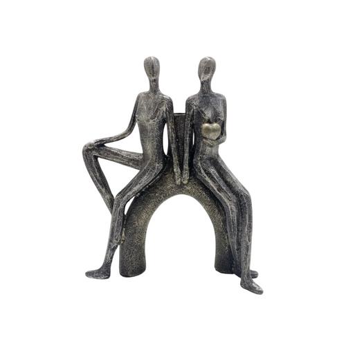 Elegant Seated Couple Figurine