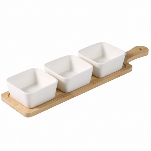 Set of three square ceramic bowls on a wooden tray with a white background