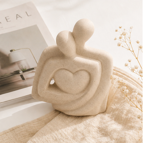 Elegant Couple Embrace Abstract Sculpture