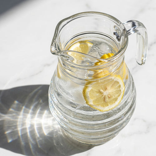 Elegant Ribbed Beverage Pitcher with Sturdy Handle
