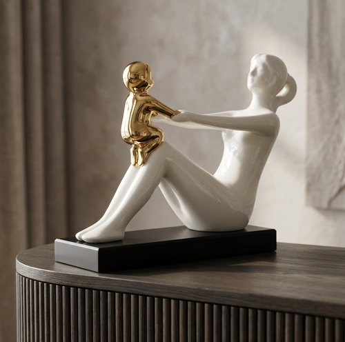Modernist Mother Holding Child Statue