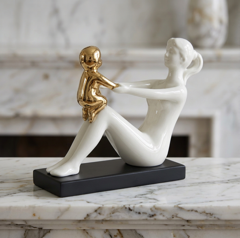 Modernist Mother Holding Child Statue