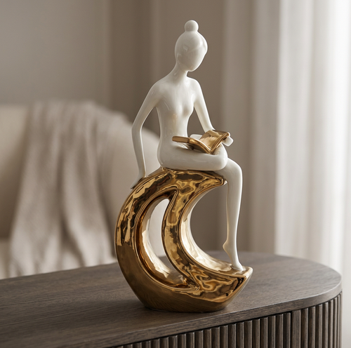 Elegant Reader on Crescent Moon Sculpture