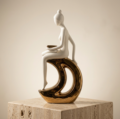 Elegant Reader on Crescent Moon Sculpture