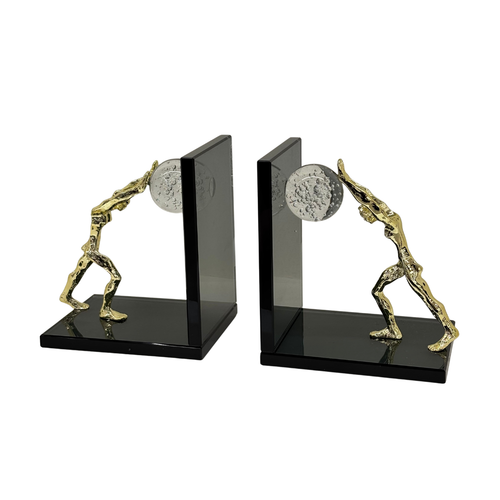 Golden Pushing Man Glass Bookends